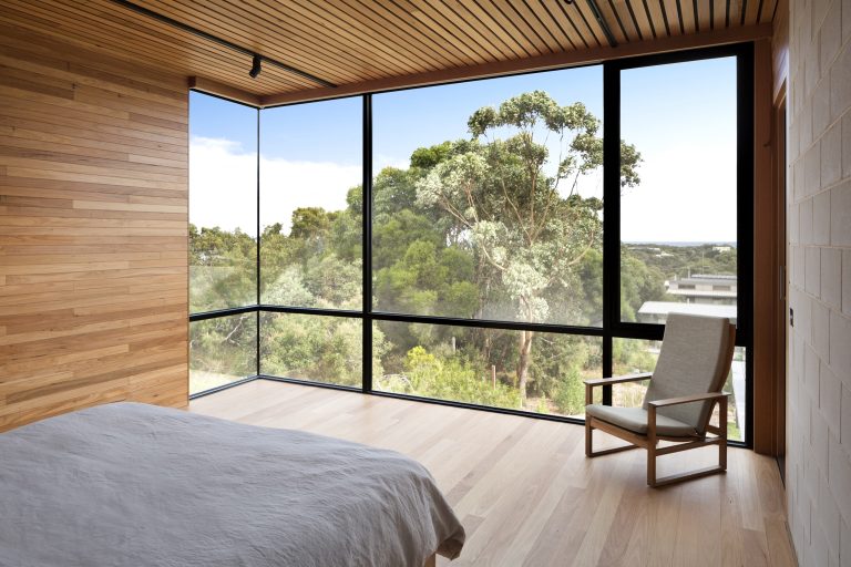 interior photograph of bedroom with bush view by sarah anderson photography 768x512